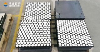 精城特瓷耐磨陶瓷在矿石码头装卸设备的防磨应用